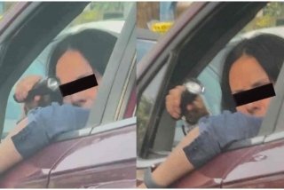 Sociedad en descomposici&oacute;n: mujer saca t&aacute;ser por un paso vehicular en Puebla
